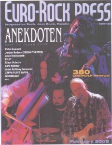 A magazine cover with people playing instruments