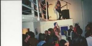 A group of people sitting around in a room.