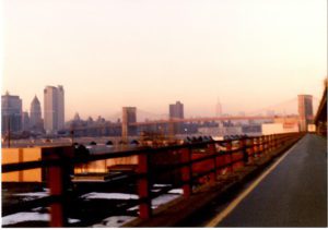 A bridge with a view of the city.