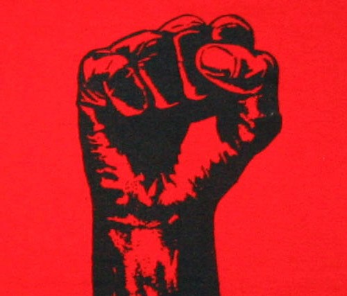 A red and black picture of a fist